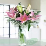 RAMO DE LILIUM CON FLORERO (COLORES SEGUN DISPONIBILIDAD )